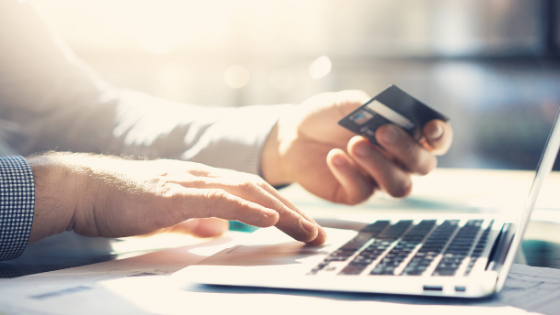 Person making a credit card payment